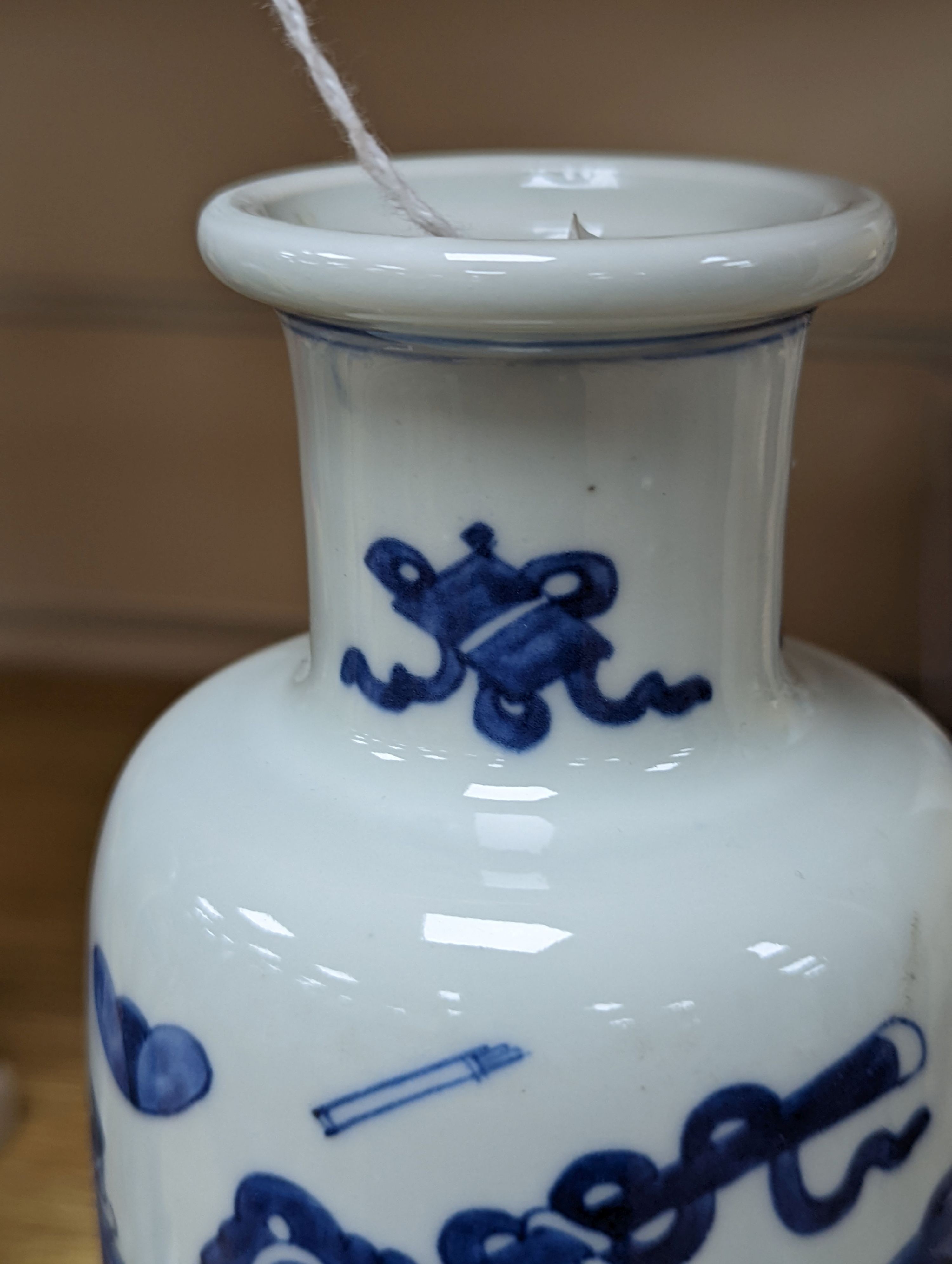 A Chinese blue and white ‘Antiques’ vase, 19.5 cms high.